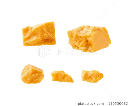 cheddar cheese cubes isolated on a white background. cheddar cheese cubes isolated on a white background. 130530082