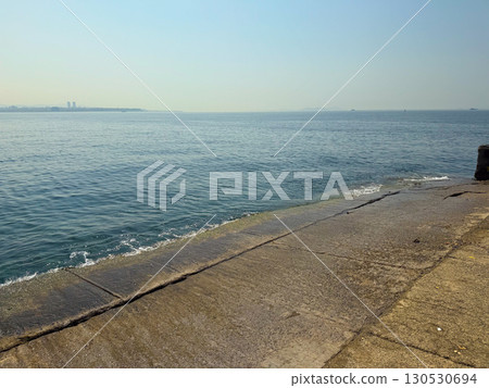 Calm Bosphorus surface with horizon stretching into the distance. Nature, silence, and water landscape creating atmosphere of tranquility and space. 130530694