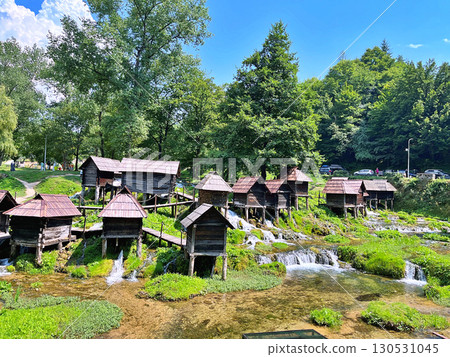 A group of disused mini wooden watermills (known as Mlincici) located on Pliva Lake (Plivska Jezera) near Jajce, Bosnia and Herzegovina 130531045