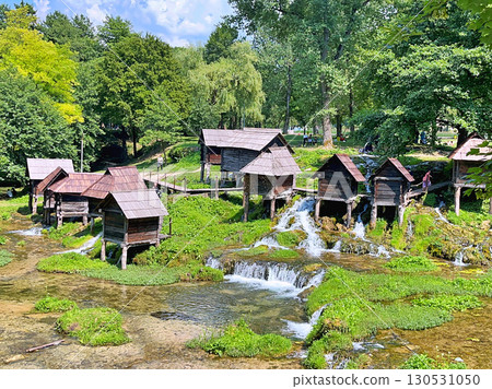 A group of disused mini wooden watermills (known as Mlincici) located on Pliva Lake (Plivska Jezera) near Jajce, Bosnia and Herzegovina A group of disused mini wooden watermills (known as Mlincici) located on Pliva Lake (Plivska Jezera) near Jajce, Bosnia and Herzegovina 130531050