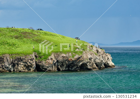 The nature of the Khasansky district of Primorsky Krai, Russia. The lip of the Teal of the Slavic Bay, the inner bay of Peter the Great in the summer. The nature of the Khasansky district of Primorsky Krai, Russia. The lip of the Teal of the Slavic Bay, the inner bay of Peter the Great in the summer. 130531234