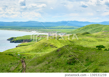 The nature of the Khasansky district of Primorsky Krai, Russia. The lip of the Teal of the Slavic Bay, the inner bay of Peter the Great in the summer. The nature of the Khasansky district of Primorsky Krai, Russia. The lip of the Teal of the Slavic Bay, the inner bay of Peter the Great in the summer. 130531239
