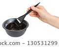 Hair dye preparation with brush in mixing bowl isolated on transparent background 130531299