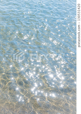 View of the sea and red lighthouse at Onishi Twin Beach in Hokkaido (clear summer weather) View of the sea and red lighthouse at Onishi Twin Beach in Hokkaido (clear summer weather) 130531420