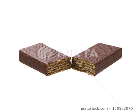 Sweet chocolate wafer broken into two pieces isolated on white background. 130532070