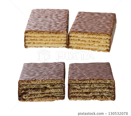Halves chocolate bar with milk cream and wafer filling isolated on a white background. 130532078