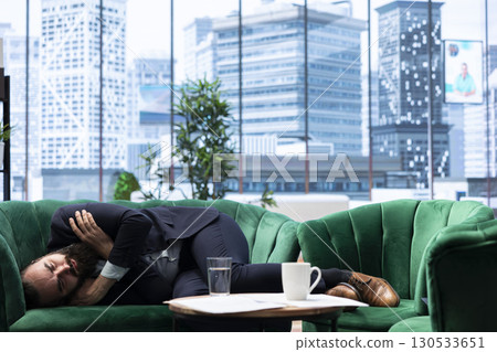 Corporate boss faces burnout and struggles with money loss and economic problems affecting his business, showing the panic and depression of high level management. Hedge fund risks. Corporate boss faces burnout and struggles with money loss and economic problems affecting his business, showing the panic and depression of high level management. Hedge fund risks. 130533651