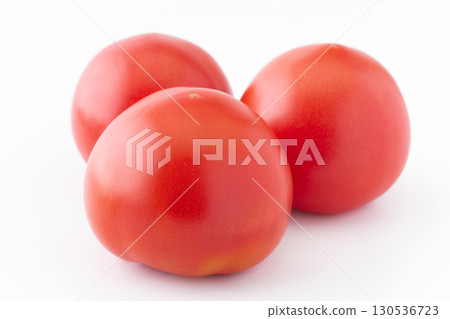 Three tomatoes on a white background 130536723
