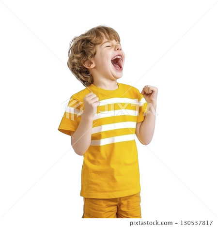 A young boy in yellow striped shirt and shorts is joyfully celebrating with fists raised, expressing excitement and happiness A young boy in yellow striped shirt and shorts is joyfully celebrating with fists raised, expressing excitement and happiness 130537817