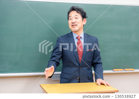 A kind-looking male teacher 130538927