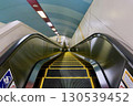 Subway entrance: Long escalator leading down to "Sapporo Subway Shin-Sapporo Station" 130539452