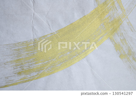 Gold painted paper 130541297