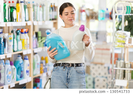 woman chooses sitting products for her home 130541733