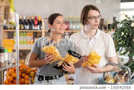 Couple opts for chips and crunchy mixes Couple opts for chips and crunchy mixes 130542568