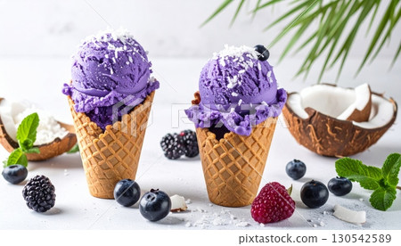 Cold ice cream dessert with fresh summer fruits and berries in a glass 130542589