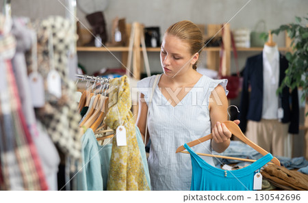 woman chooses a stylish look for the summer woman chooses a stylish look for the summer 130542696