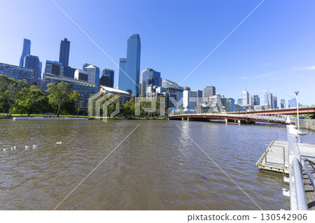 Melbourne, Australia - December 31,2023 : Yarra river view in central Melbourne with Melbourne CBD skyline, Australia on December 31,2023. Melbourne, Australia - December 31,2023 : Yarra river view in central Melbourne with Melbourne CBD skyline, Australia on December 31,2023. 130542906