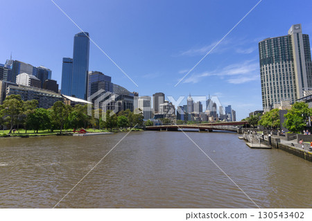 Melbourne, Australia - December 31,2023 : Yarra river view in central Melbourne with Melbourne CBD skyline, Australia on December 31,2023. Melbourne, Australia - December 31,2023 : Yarra river view in central Melbourne with Melbourne CBD skyline, Australia on December 31,2023. 130543402