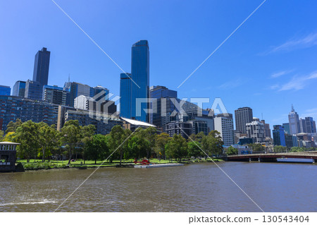 Melbourne, Australia - December 31,2023 : Yarra river view in central Melbourne with Melbourne CBD skyline, Australia on December 31,2023. Melbourne, Australia - December 31,2023 : Yarra river view in central Melbourne with Melbourne CBD skyline, Australia on December 31,2023. 130543404