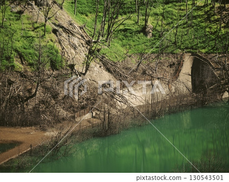 The JR Agatsuma Line tracks, tunnels, trees, and foundations submerged during the construction of the Yamba Dam due to drought 130543501