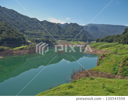 The JR Agatsuma Line tracks, tunnels, trees, and foundations submerged during the construction of the Yamba Dam due to drought 130543509