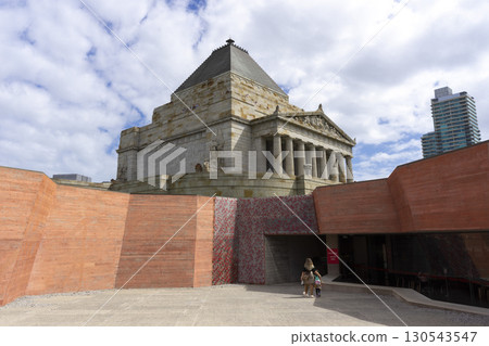Melbourne, Australia - December 30,2023 : View of the Shrine of Remembrance with people and tourists with clear blue sky in Melbourne, Australia on December 30,2023. 130543547