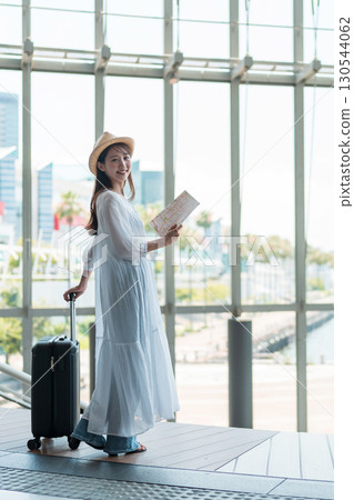 A young woman who enjoys traveling A young woman who enjoys traveling 130544062