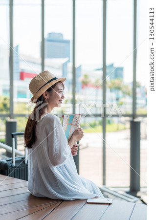 Young woman traveling Young woman traveling 130544113
