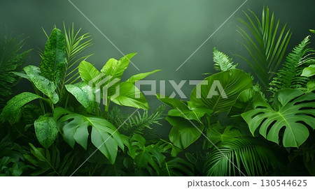 Lush Green Tropical Foliage with Different Leaf Shapes in a Soft Focus Background 130544625