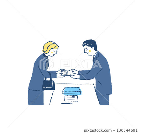 A woman in mourning clothes handing over a condolence gift and a male staff member receiving it 130544691