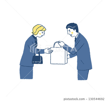 Funeral: A female mourner receives a gift from a male staff member 130544692