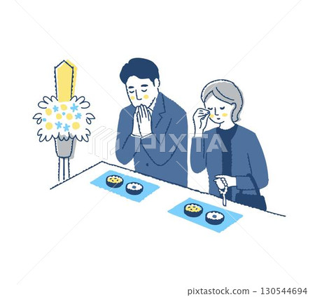 Men and women in mourning clothes standing at an incense stand at a funeral 130544694