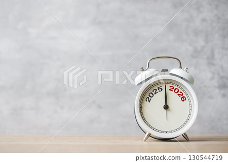 Happy New Year with vintage alarm clock and 2025 change to 2026 number. Merry Christmas, New Start, Resolution, countdown, Goals, Plan, Action and Mission Concept 130544719