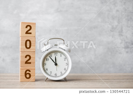 Happy New Year with vintage alarm clock and 2026  block. Christmas, New Start, Resolution, countdown, Goals, Plan, Action and Motivation Concept 130544721
