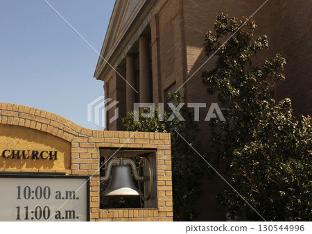 Bell and Brick Sign in Front of Historic Methodist Church in Rural East TX Bell and Brick Sign in Front of Historic Methodist Church in Rural East TX 130544996