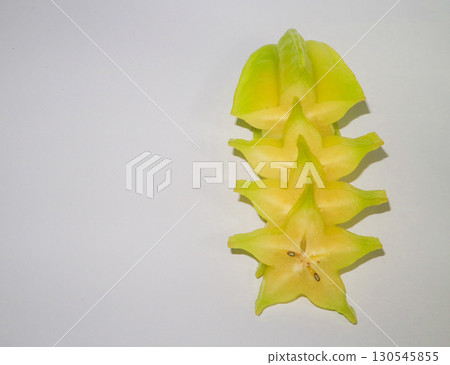Slice Star fruit or carambola on white background. Tropical food asia, organic rural farming  130545855
