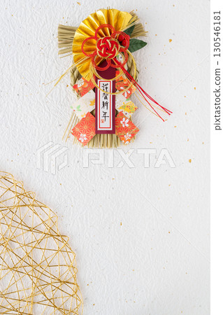 Happy New Year decorations and mizuhiki string ornaments on a white background Happy New Year decorations and mizuhiki string ornaments on a white background 130546181