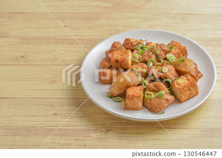 Deep-fried tofu, potatoes and chicken stir-fried with oyster sauce 130546447