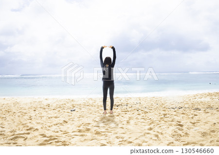 Woman looking at the sea 130546660