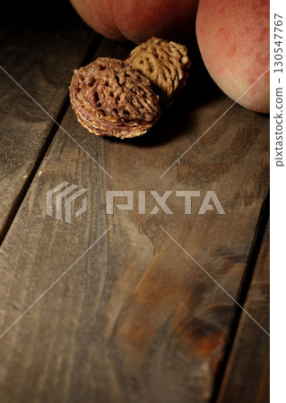 Peach and peach seeds 130547767