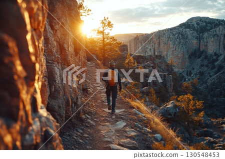 Hiking adventure at sunset mountain trail outdoor activity scenic landscape nature's beauty exploration 130548453