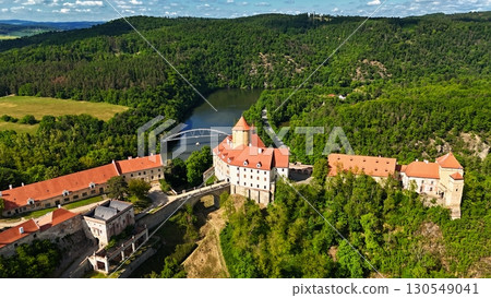 Beautiful Gothic castle Veveri. The city of Brno at the Brno dam. South Moravia - Czech Republic - Central Europe. Beautiful Gothic castle Veveri. The city of Brno at the Brno dam. South Moravia - Czech Republic - Central Europe. 130549041