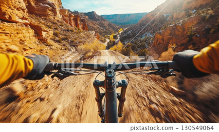 Mountain biking adventure rocky terrain action sports autumn landscape first-person view thrill of nature 130549064