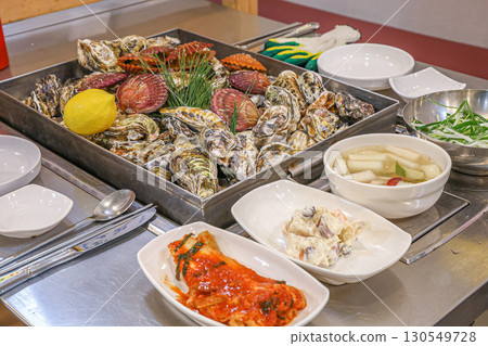 Korean Seafood Food. Steamed oysters and scallops 130549728