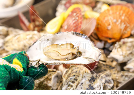 Korean Seafood Food. Steamed oysters and scallops Korean Seafood Food. Steamed oysters and scallops 130549739