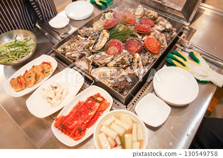 Korean Seafood Food. Steamed oysters and scallops 130549758