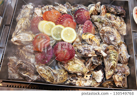 Korean Seafood Food. Steamed oysters and scallops Korean Seafood Food. Steamed oysters and scallops 130549768
