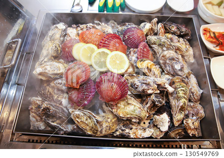 Korean Seafood Food. Steamed oysters and scallops 130549769
