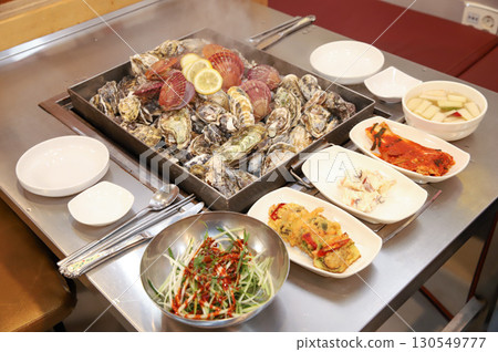Korean Seafood Food. Steamed oysters and scallops 130549777