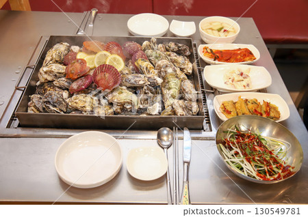 Korean Seafood Food. Steamed oysters and scallops 130549781